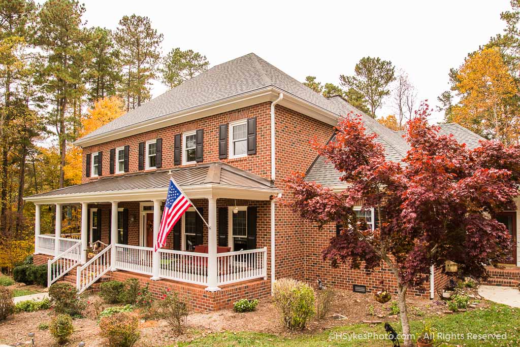 Architectural photograph of a brick house by Howard Sykes