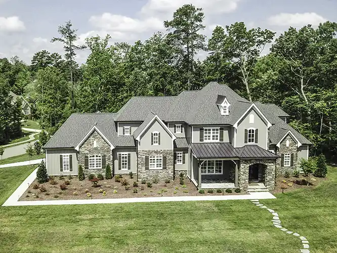 Aerial photography of a house from a drone which is also known as a UAS or UAV.