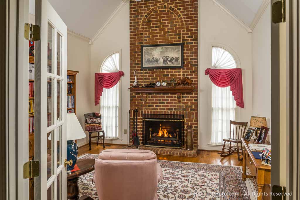 Architectural Photograph of a Living Room with Fireplace photographed by Howard Sykes