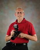 Photographer Howard Sykes Self Portriat with camera