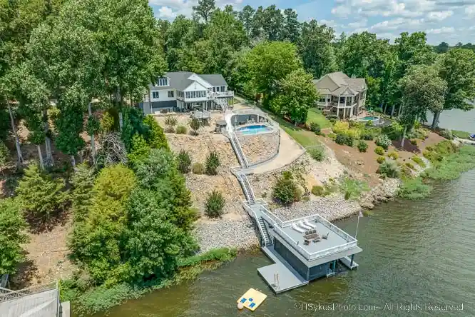 Drone real estate photo of a house on a cliff