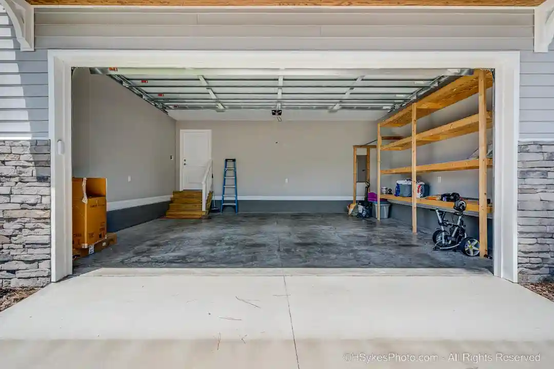 Garage with entrance to the laundry