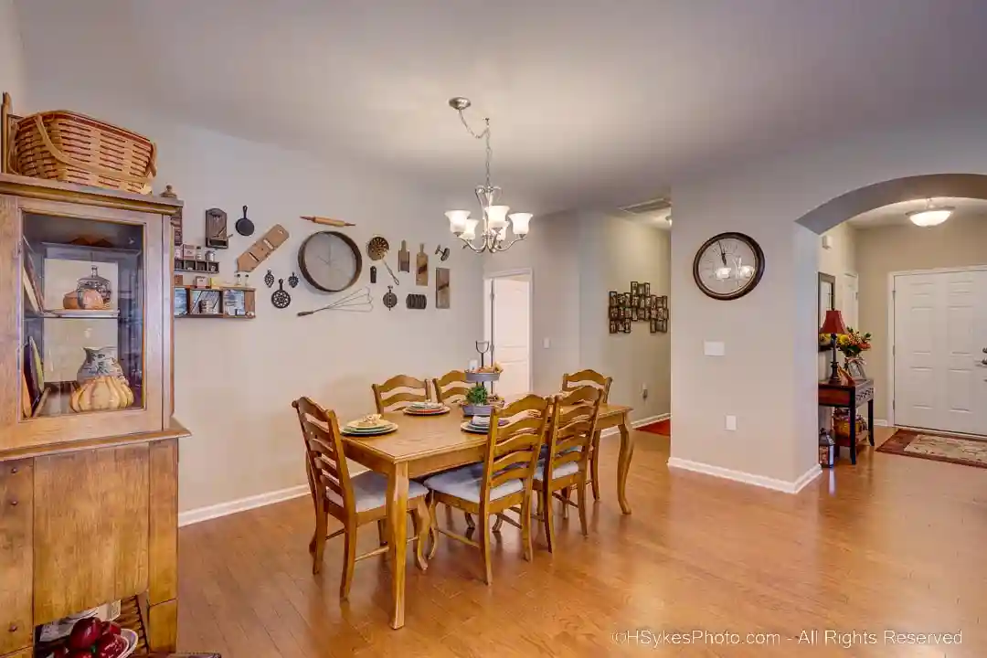 Dining room with front hall and garage hall in background