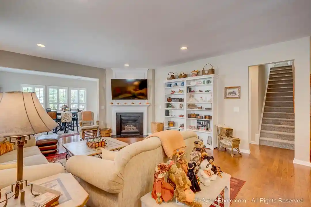 Living room looking towards second floor stairs