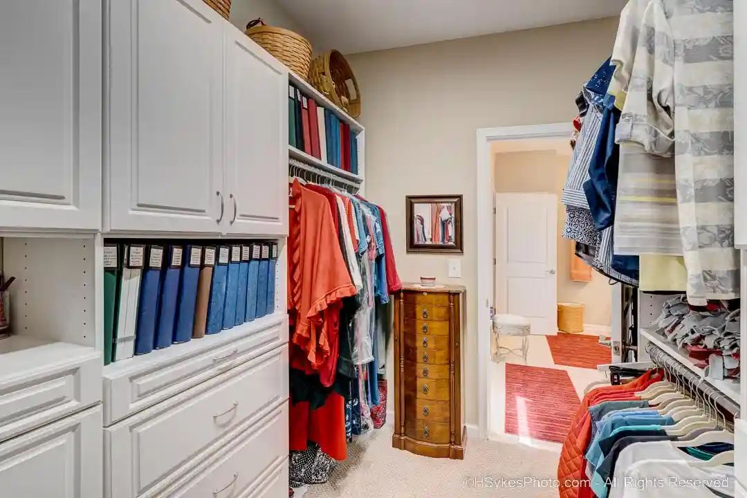 Primary closet looking towards primary dressing room