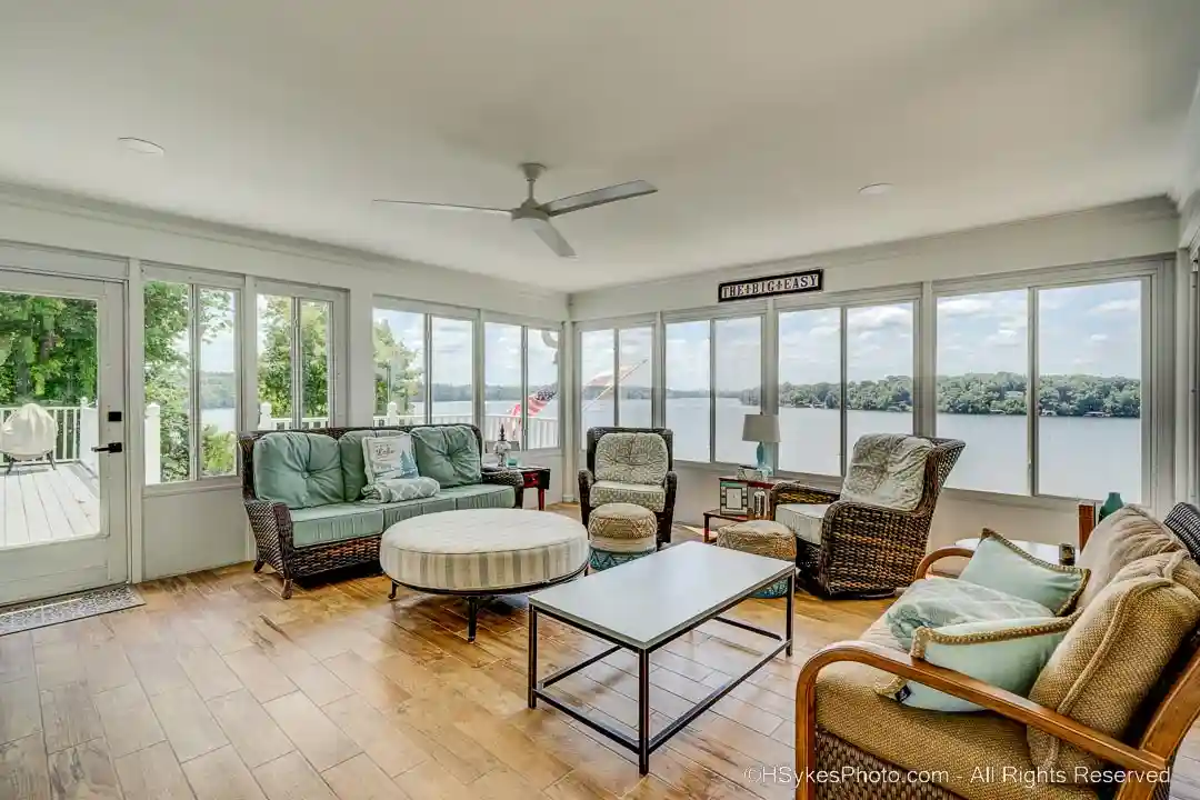 Rear sunroom overlooking lake