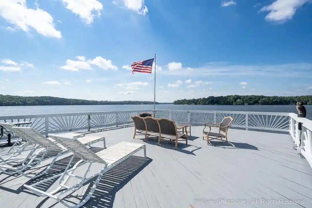 Deck on top of boat house wiht a view of the lake